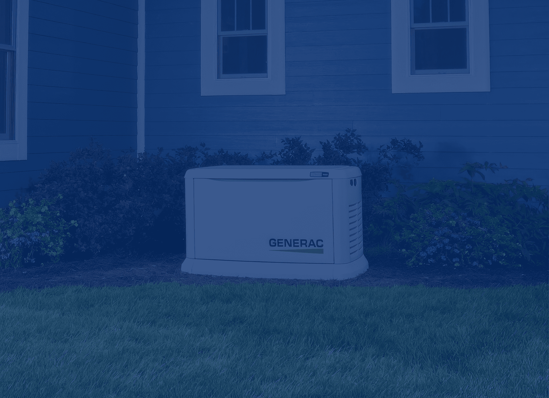 Outdoor backup generator near a blue house, surrounded by greenery. The overcast lighting adds a calm, reliable atmosphere.